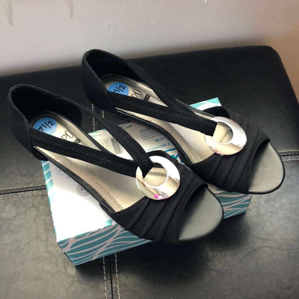 Dressy open toe wedge sandal. NWOT